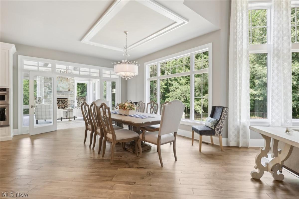 Dining room with a chandelier.