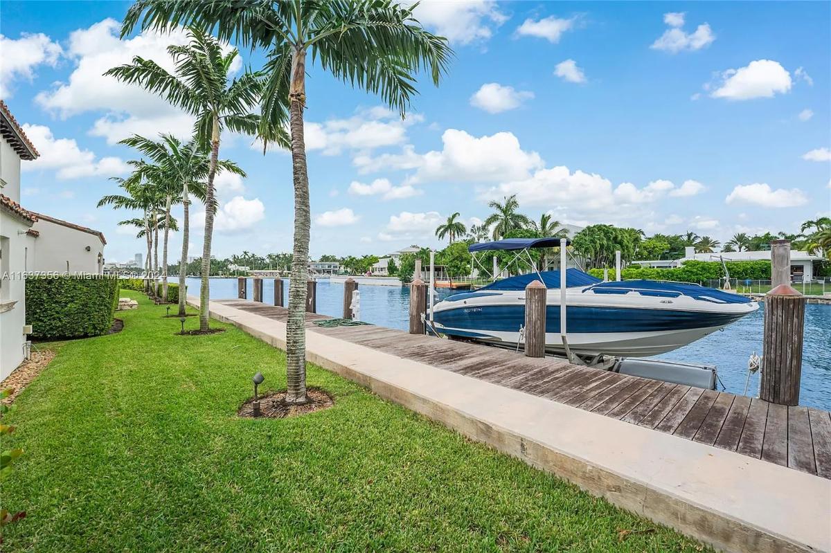 Boat dock with a speed boat.
