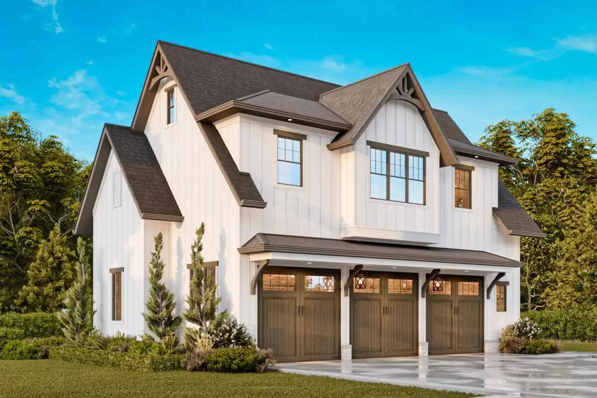 Rear-right view showcasing the 3-car garage.