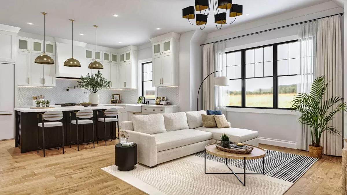 Kitchen and living room brightened by black-framed windows.