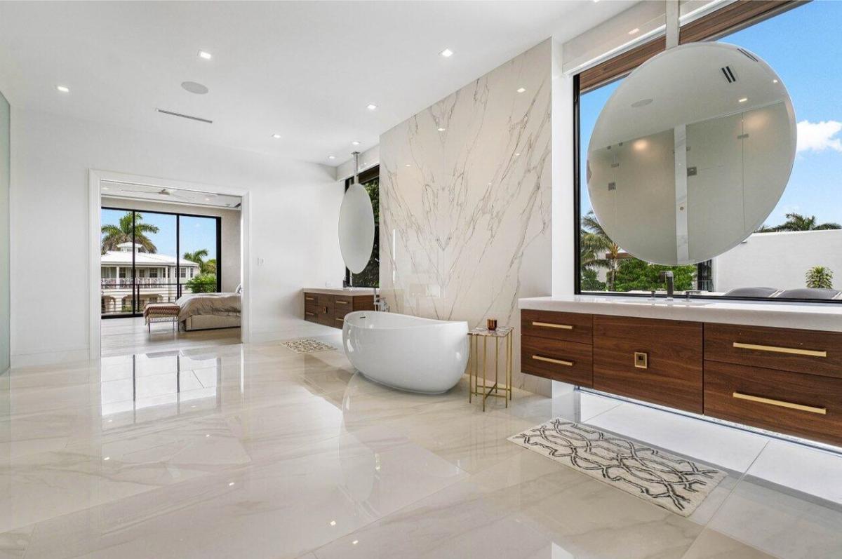 Bathroom with a custom-made vanity and a soaking tub.