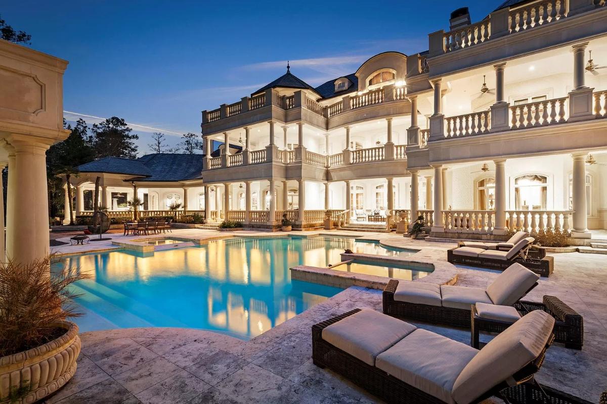 Pool with lounge chairs.