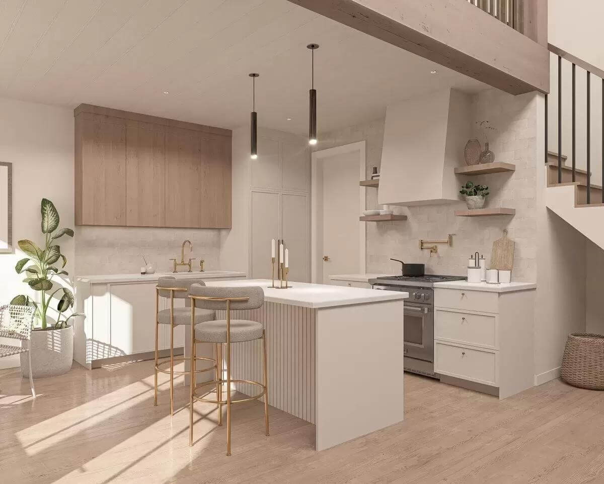 Kitchen with cream cabinets and a matching island with seating for two.
