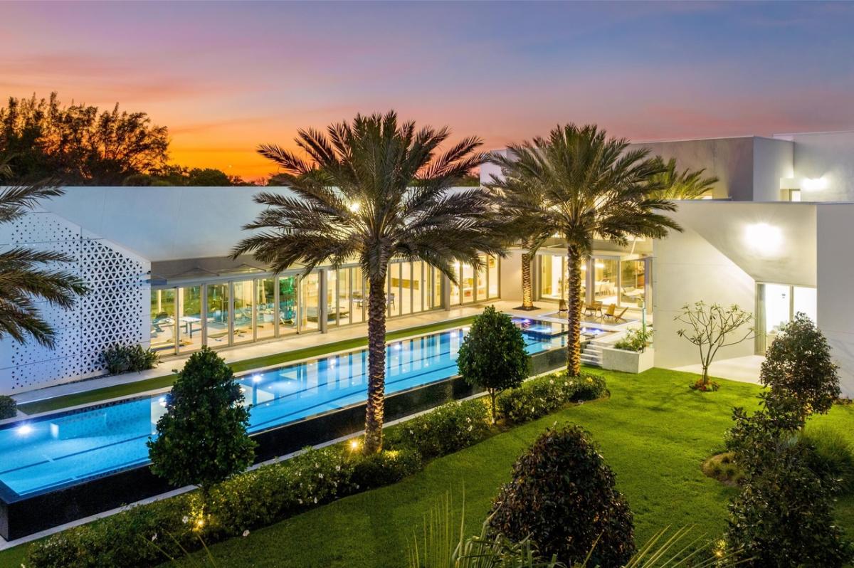Backyard of the mansion with a pool.