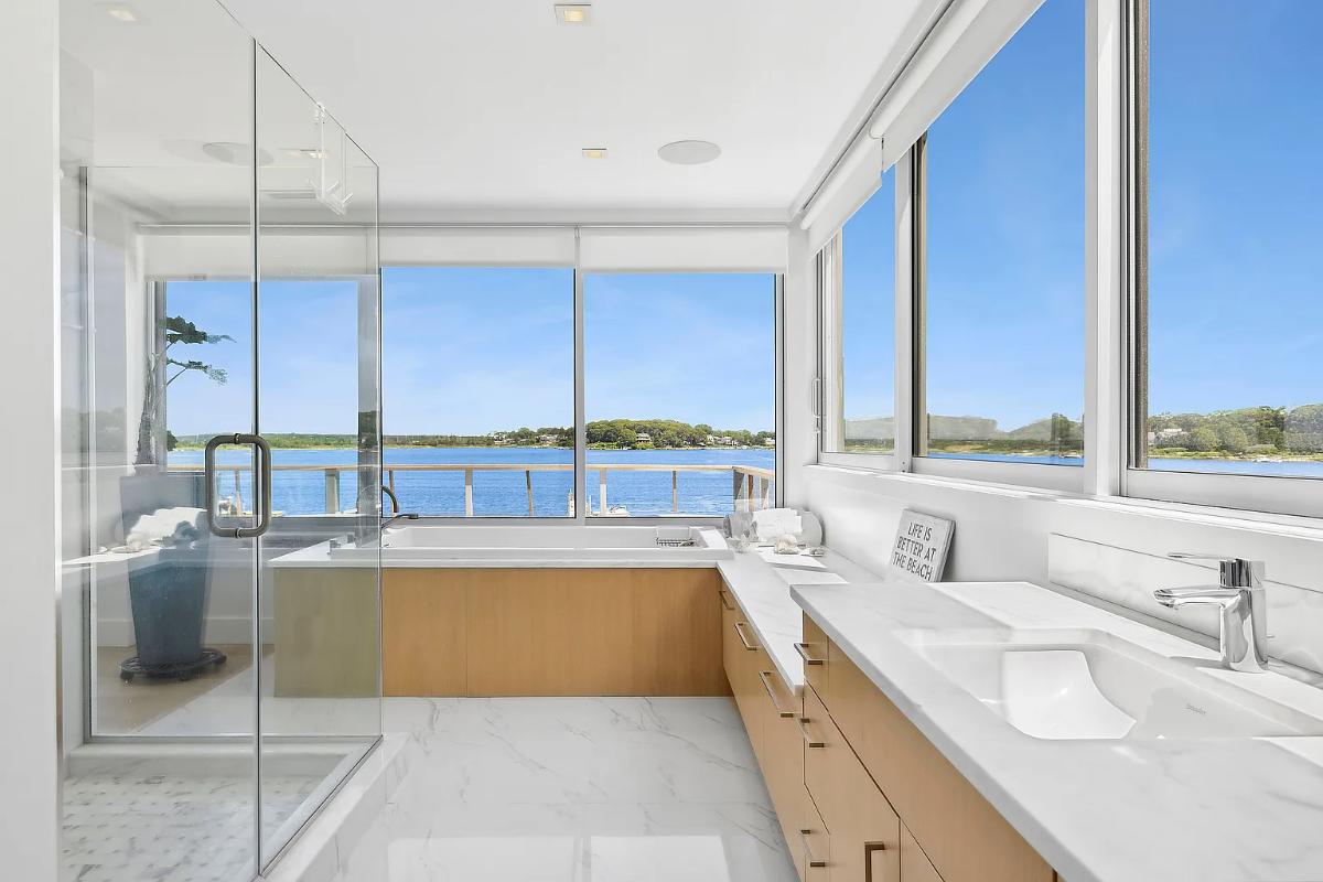 Bathroom with a sink, a soaking tub and a walk-in shower.