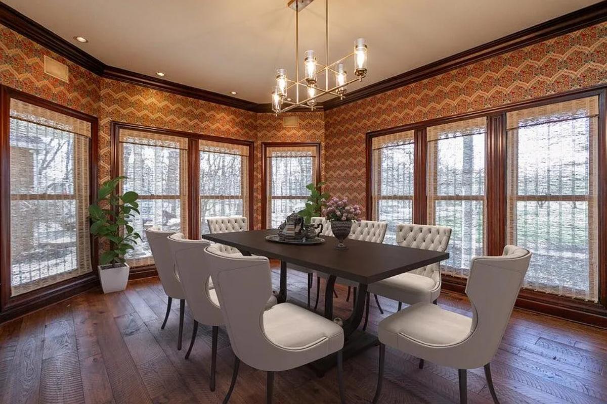 Dining room with a large table.
