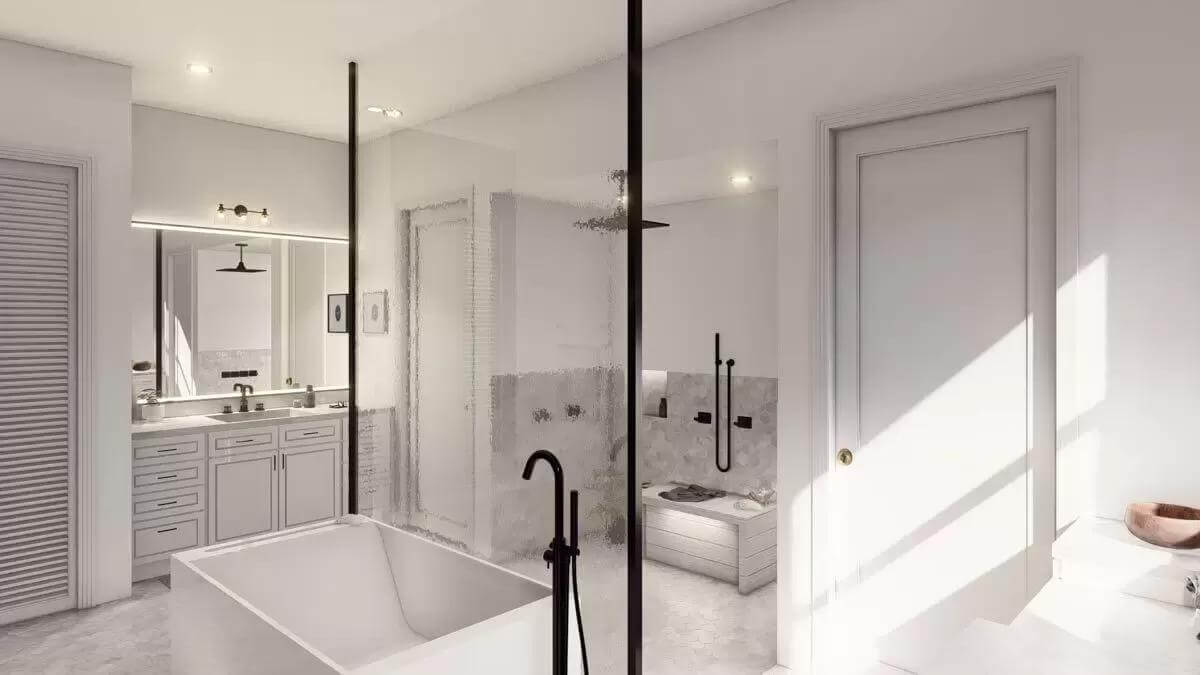 Primary bathroom showcasing the freestanding tub and glass shower with a bench.