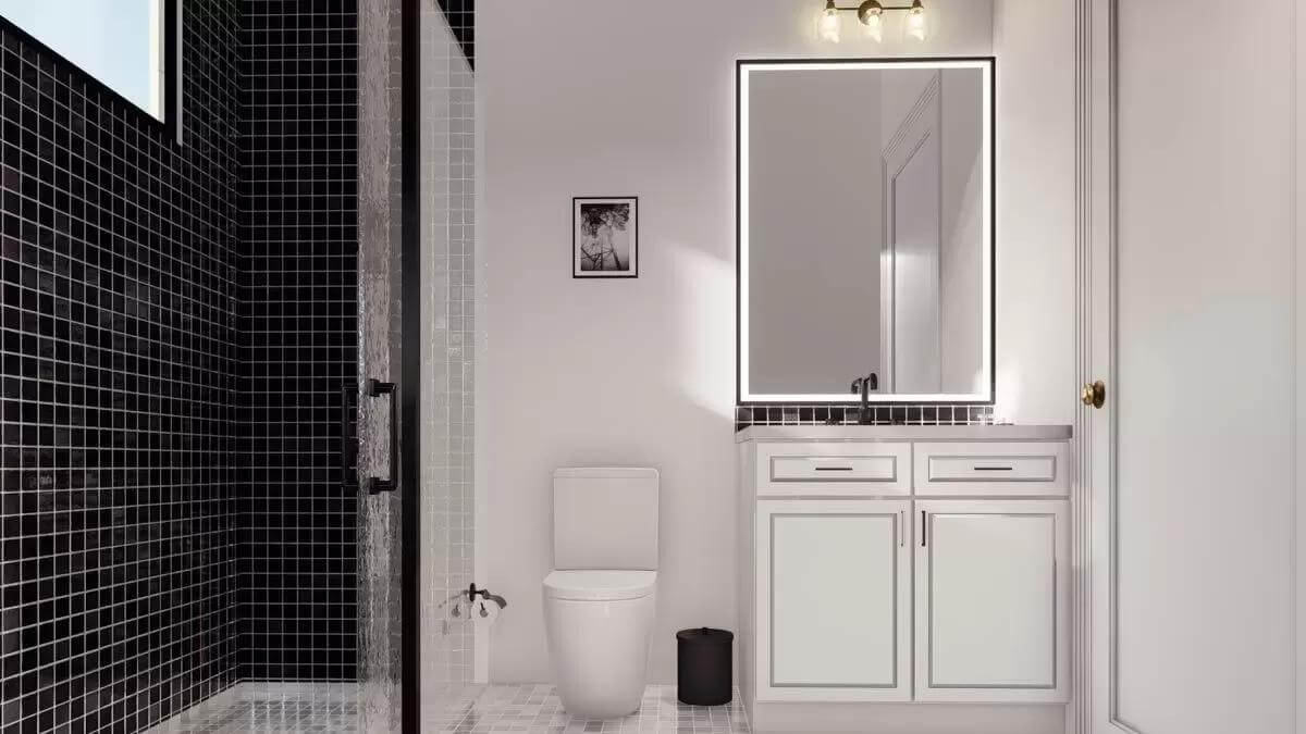 Bathroom with a white vanity and a tiled shower.