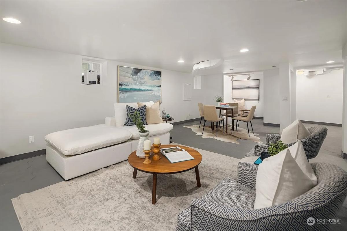 Family room with couches and a dining area.