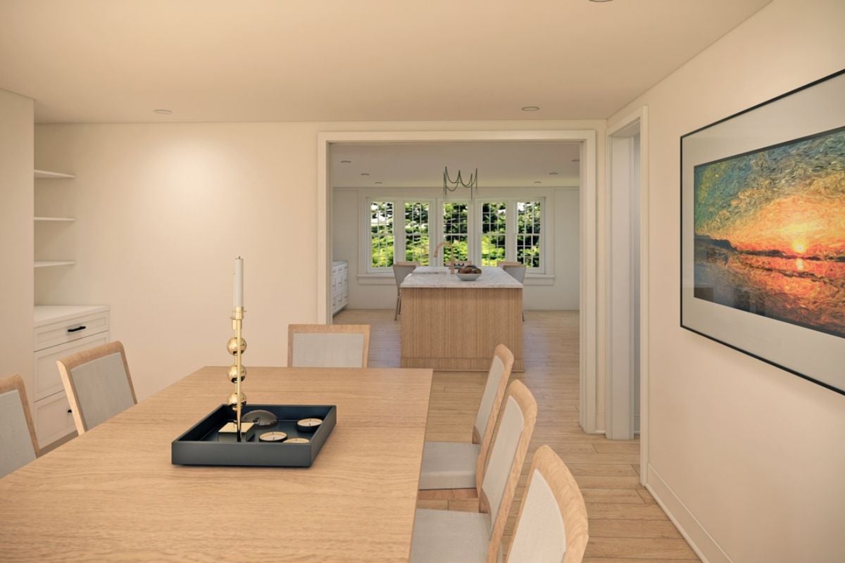 A dining room with a painting and a wooden dining table surrounded by chairs.