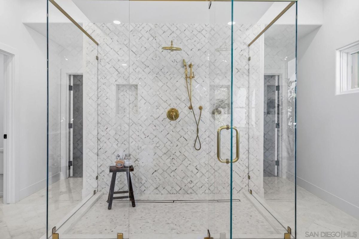 A bathroom with a glass shower.