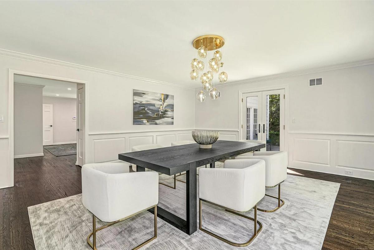 Dining room with a large wood table.