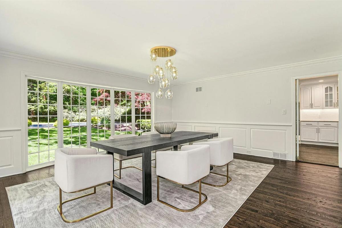 Dining room with a large wood table.
