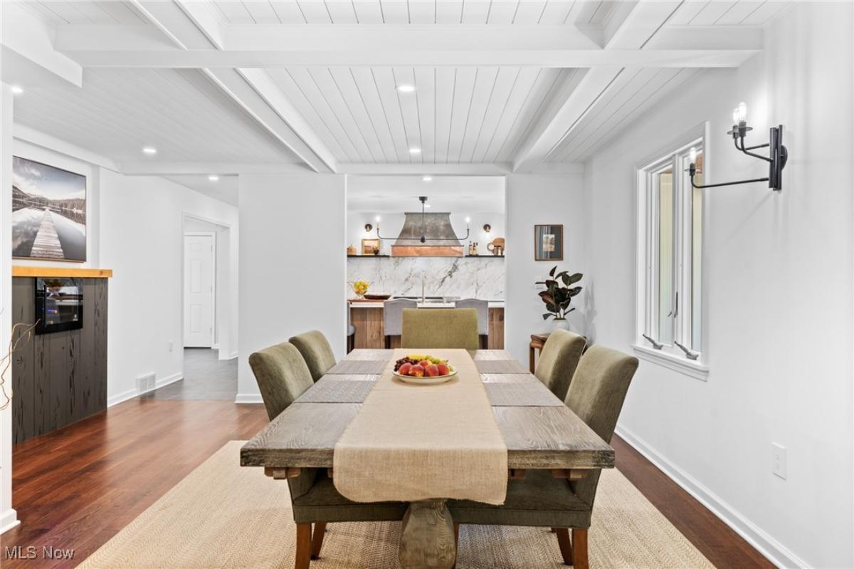 Dining room with a large wood table.