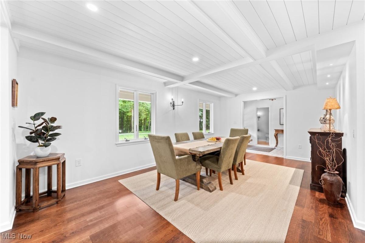 Dining room with a large wood table.