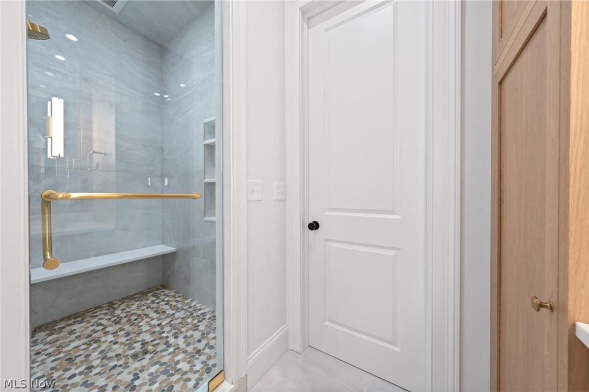 Bathroom with a walk-in shower.