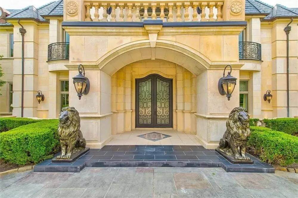 Close-up of grand entrance with lion statues