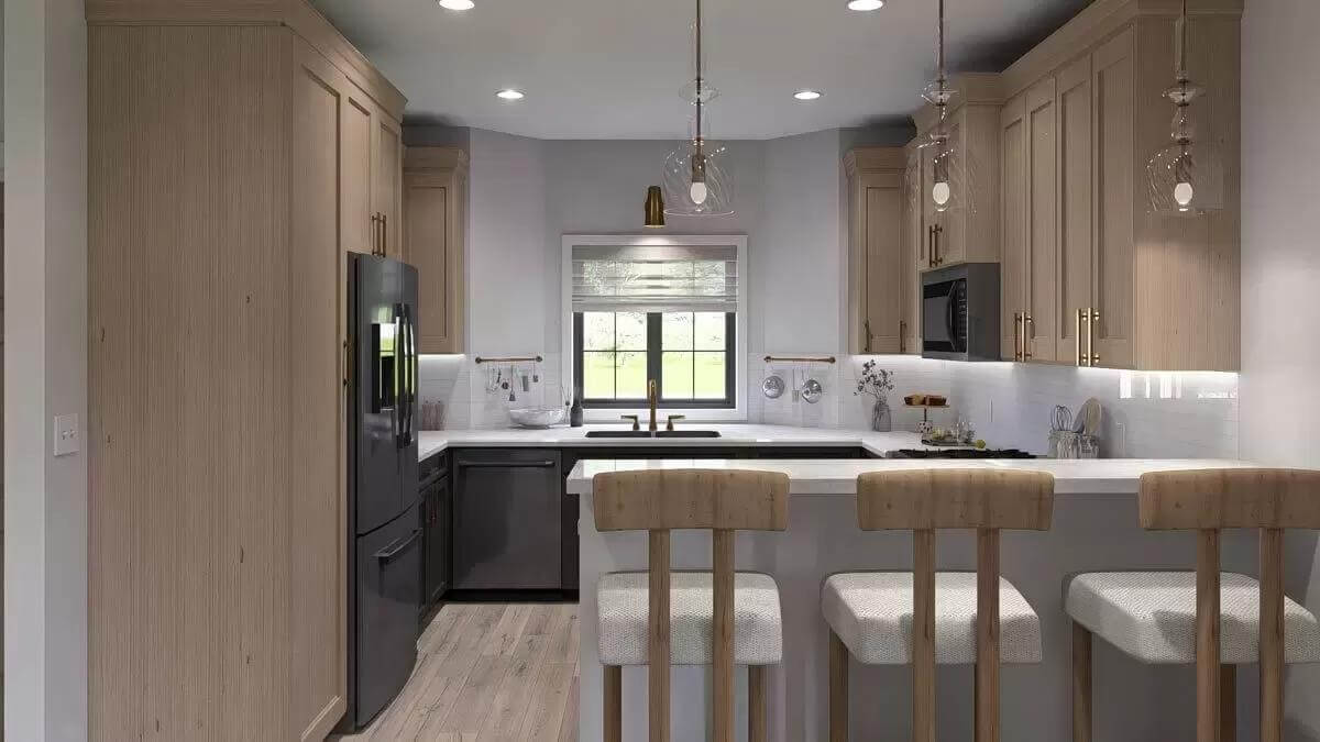 The kitchen includes slate appliances and a prep sink set under the window.