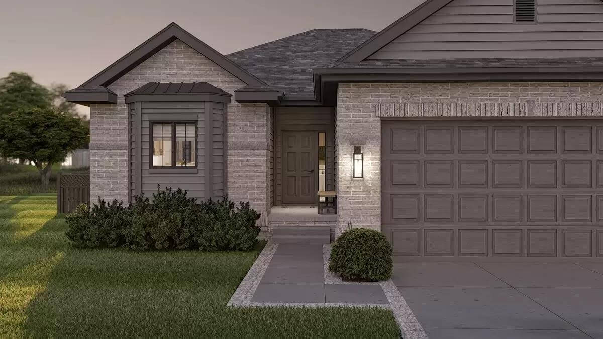 Front entry with concrete walkway and a wooden front door.