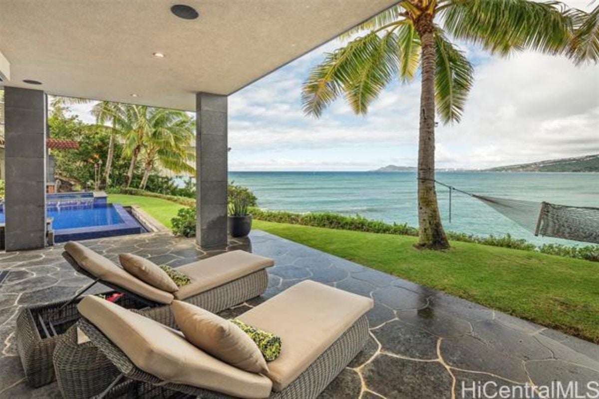 A patio with comfy chairs.