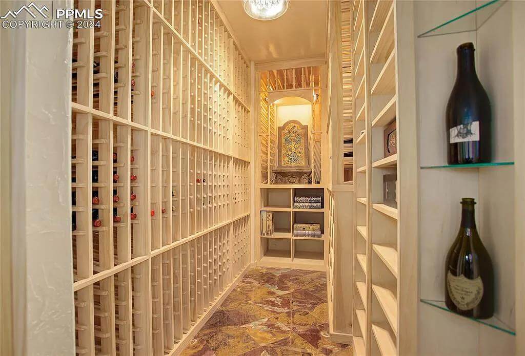 Wine cellar with built-in racks and shelves.