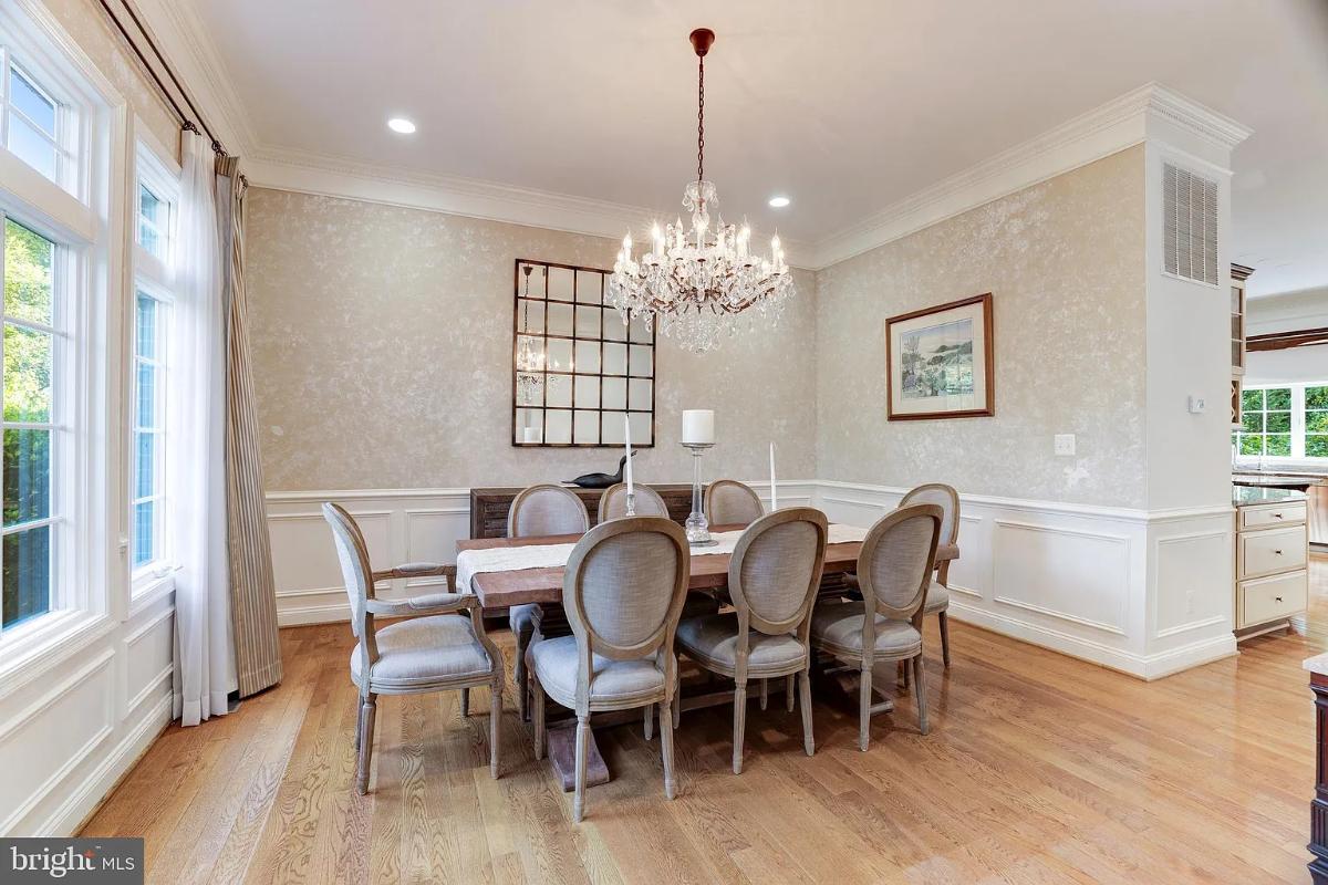 Dining room with a chandelier.