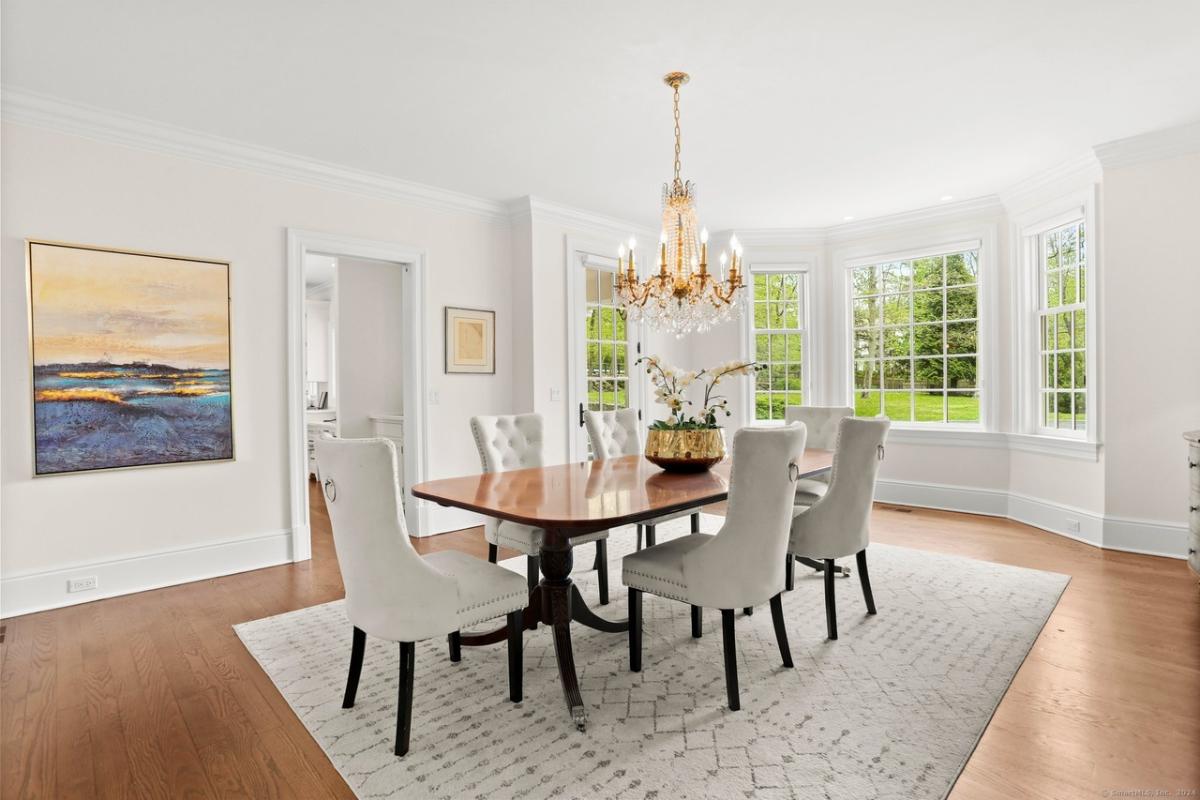 Dining room with a chandelier.