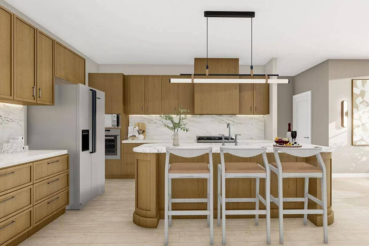 Kitchen with wooden cabinetry and a matching island with seating for three.