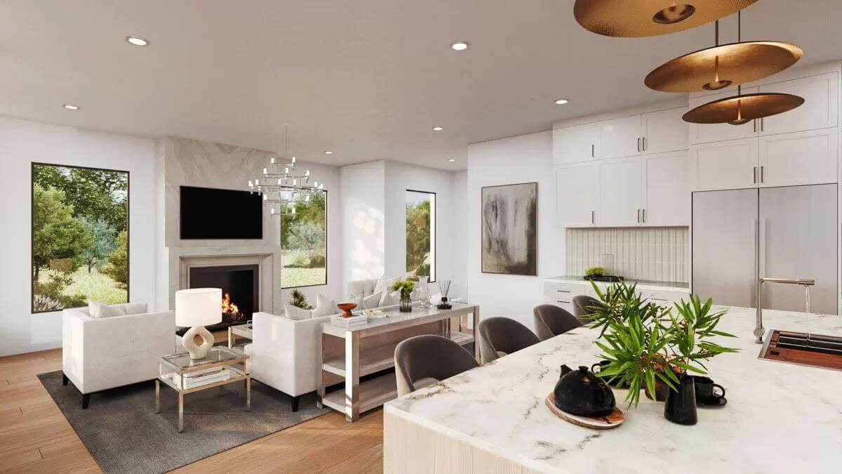Living room and kitchen warmed by a fireplace.