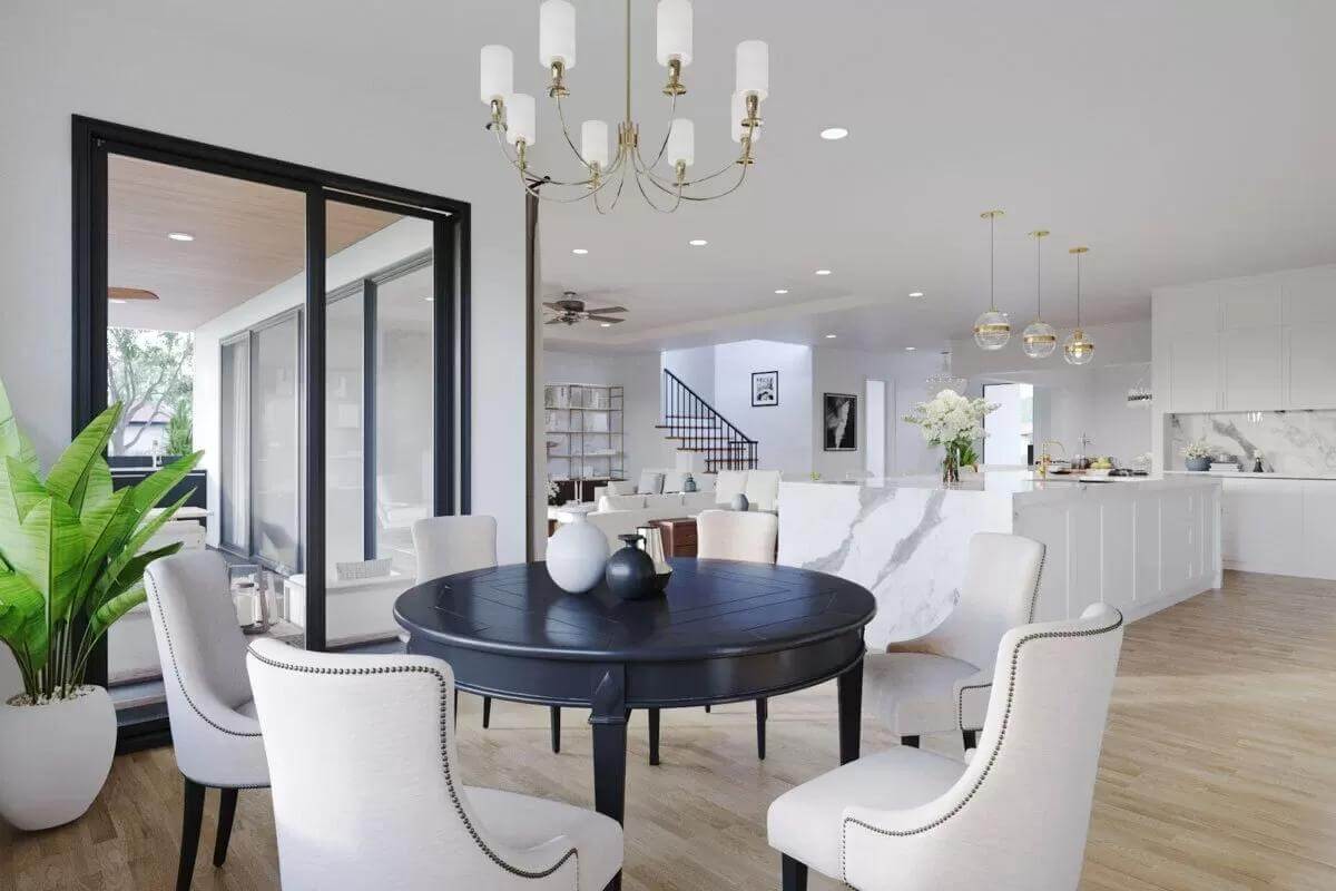 Breakfast nook with a round dining set and sliding glass doors that open the rear porch.