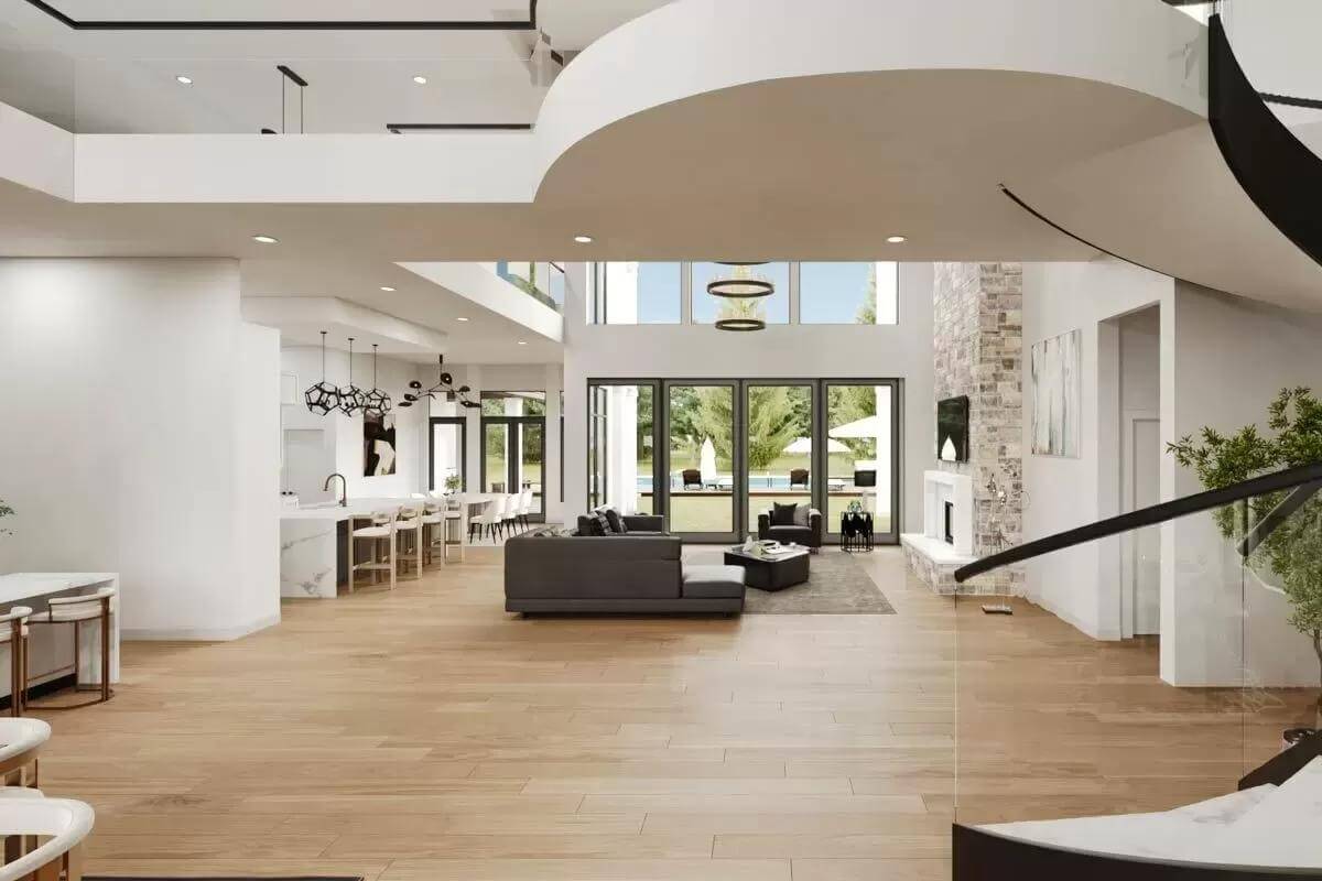 Foyer with a winding staircase and a great view of the open living space.
