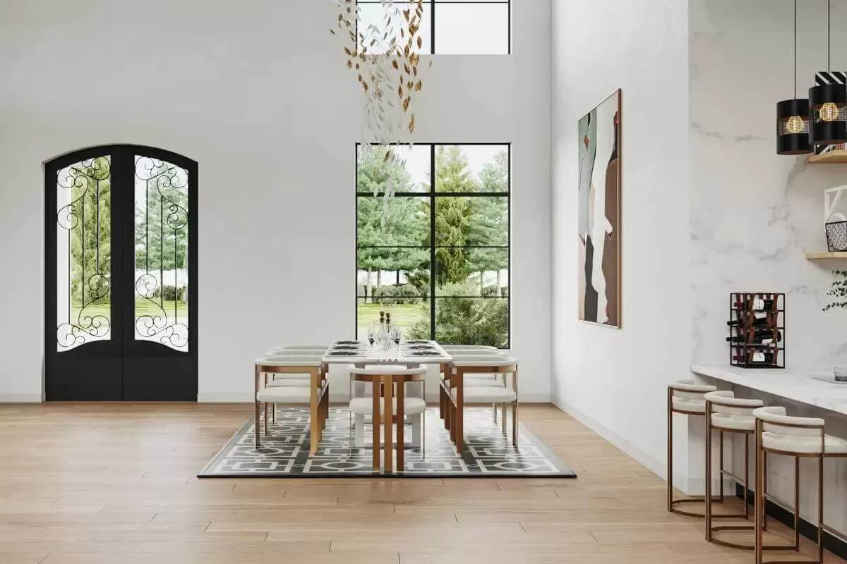 Dining room with a contemporary dining set illuminated by a cascading chandelier and large windows.