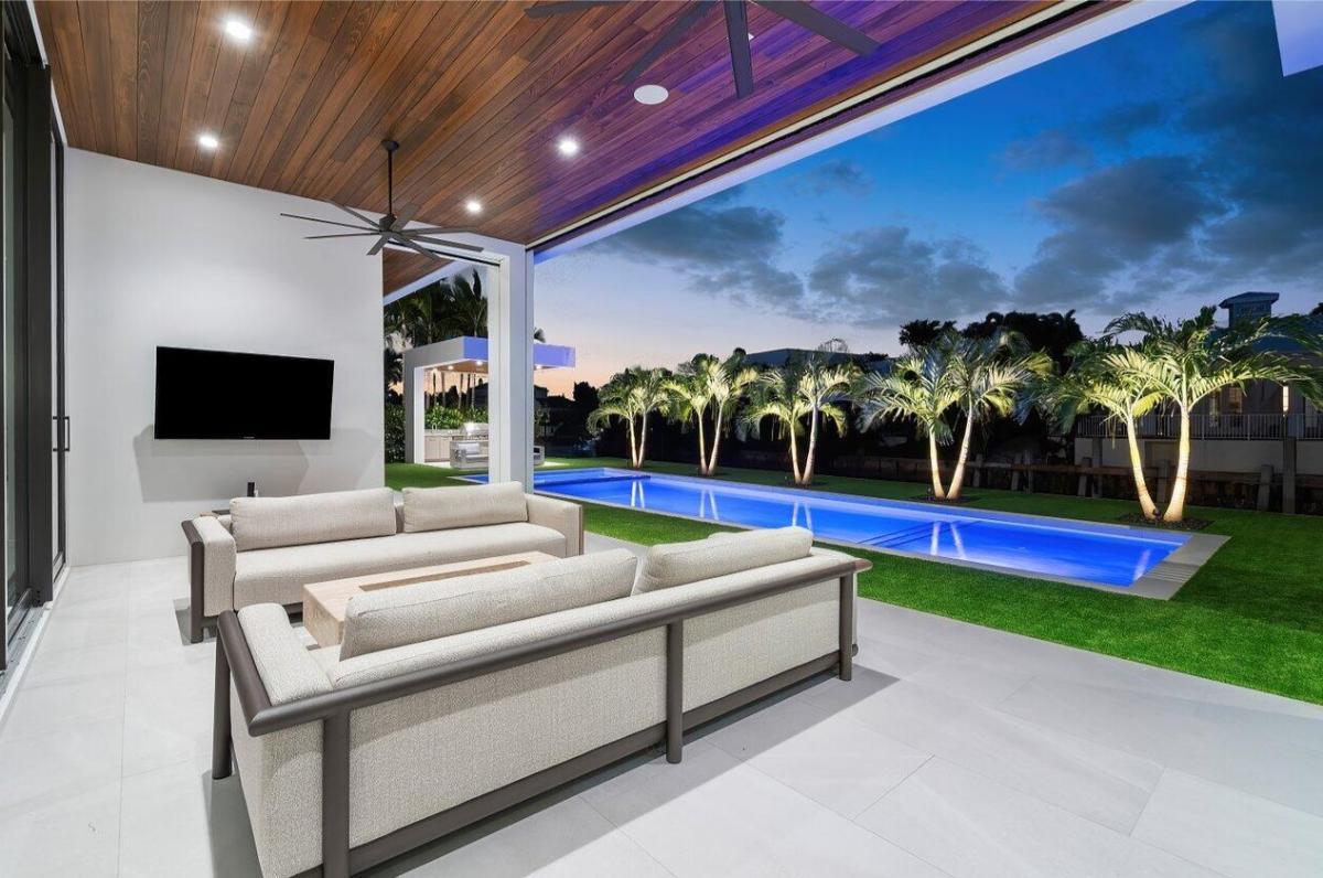 Outdoor living space with a TV.