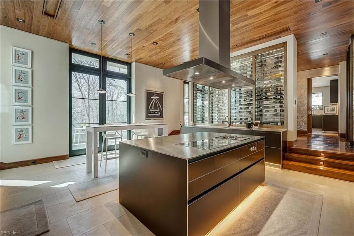 Kitchen with a counter breakfast bar and a center island prep area.