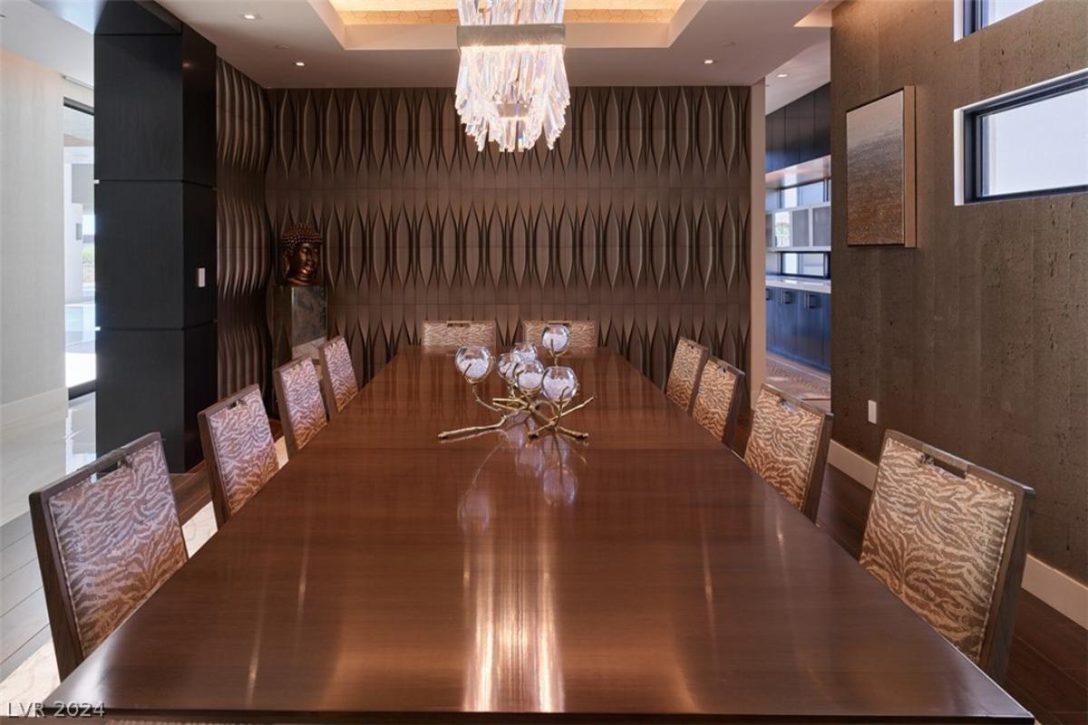 Dining room with a chandelier.
