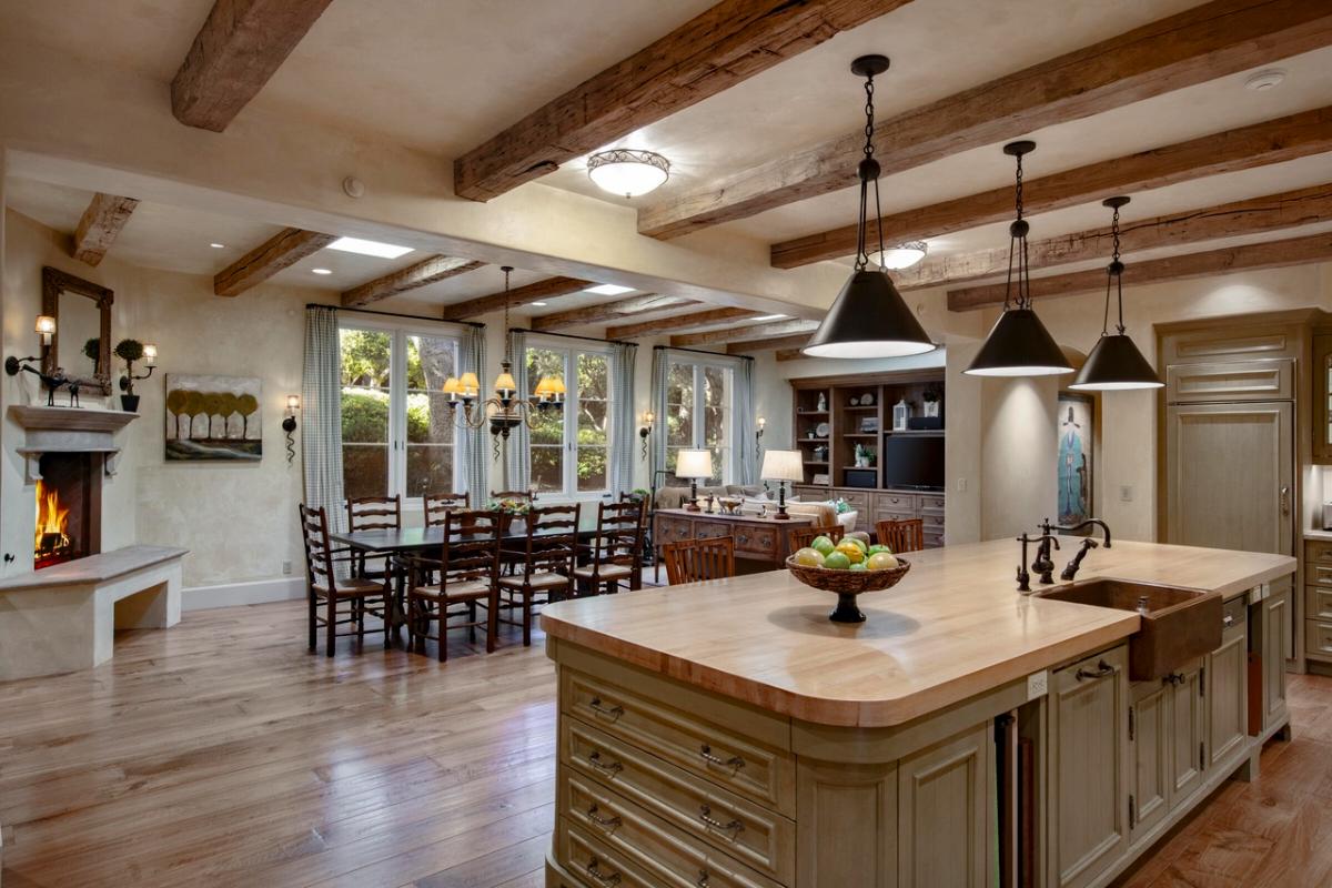 Kitchen with a breakfast nook and a fireplace.