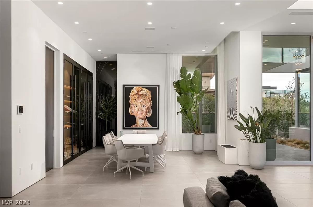 Dining room with a large table and chairs.
