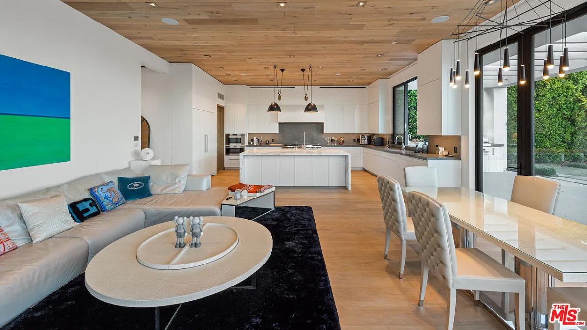 Interior view of the house with living space, a dining area and a kitchen.