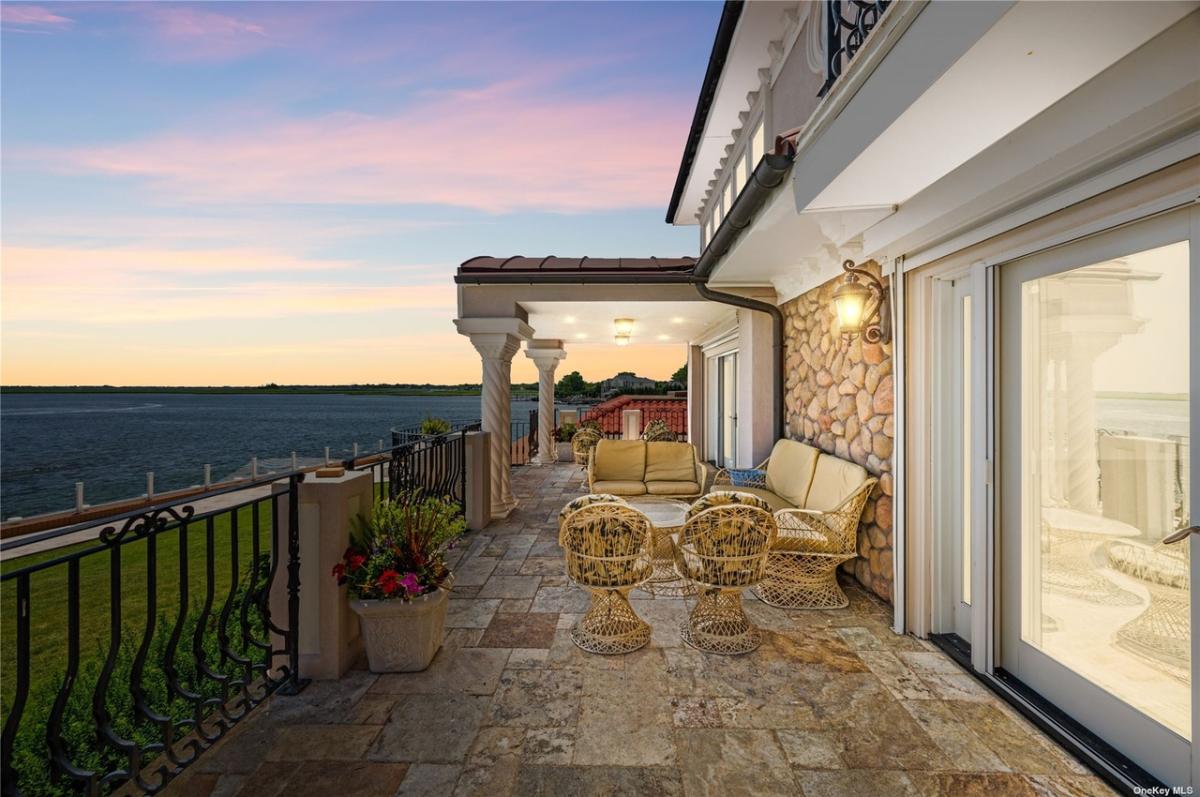 Terrace with tables and chairs.