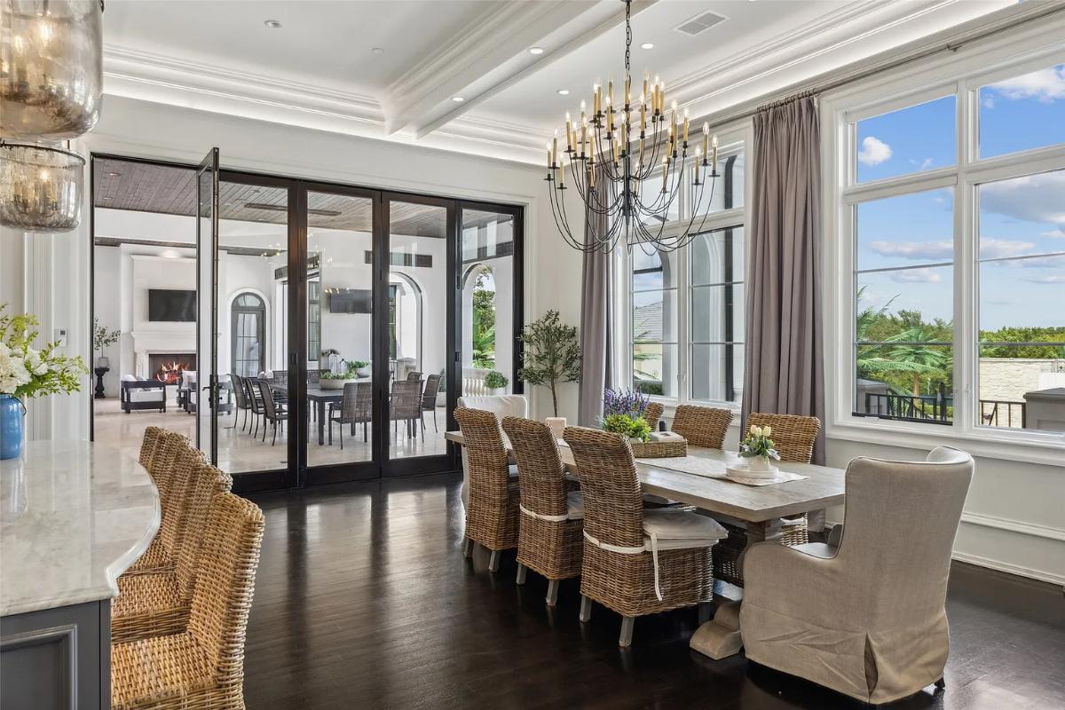 Breakfast nook with a chandelier.