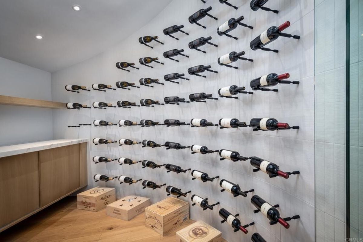 A wine cellar with wine racks.