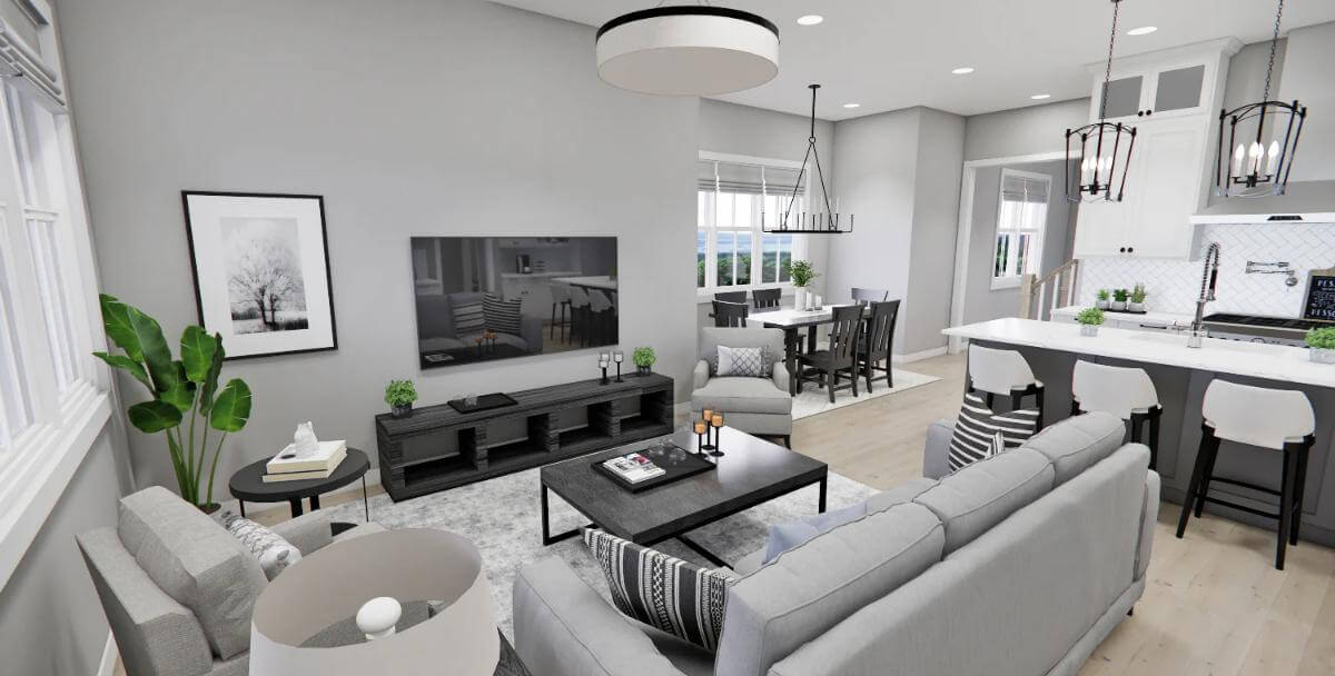 Great room with gray seats, a black coffee table, and a wall-mounted TV.