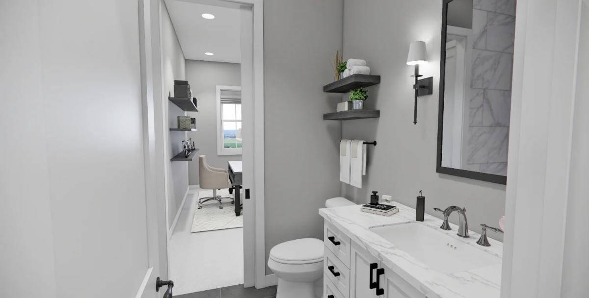 Bathroom with a white vanity and floating shelves fixed above the toilet.