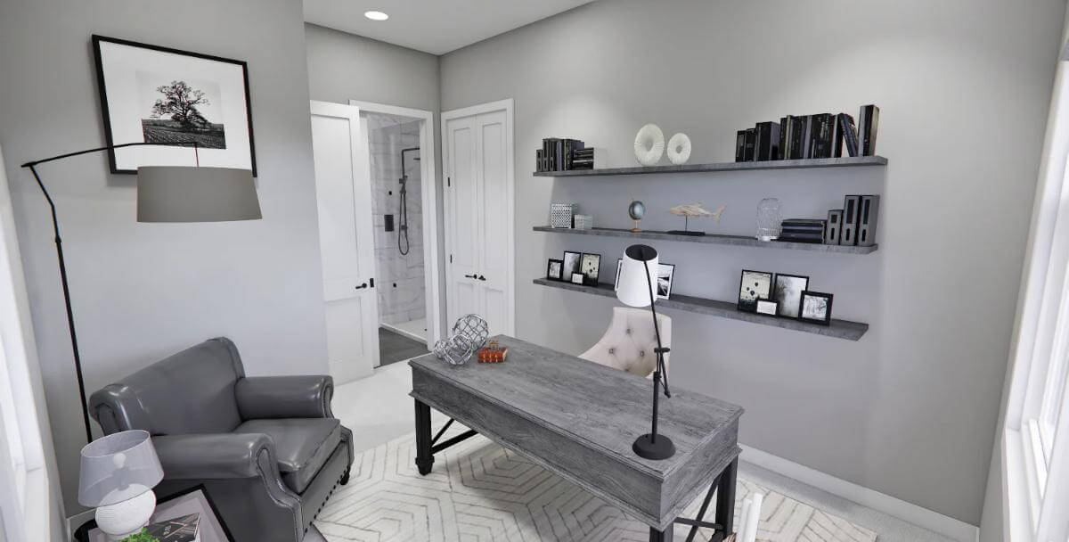 Office with leather chairs and rustic desk over the patterned area rug.