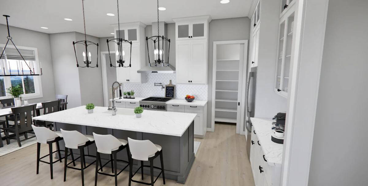 Kitchen with white cabinets and a breakfast island topped by wrought iron chandeliers.