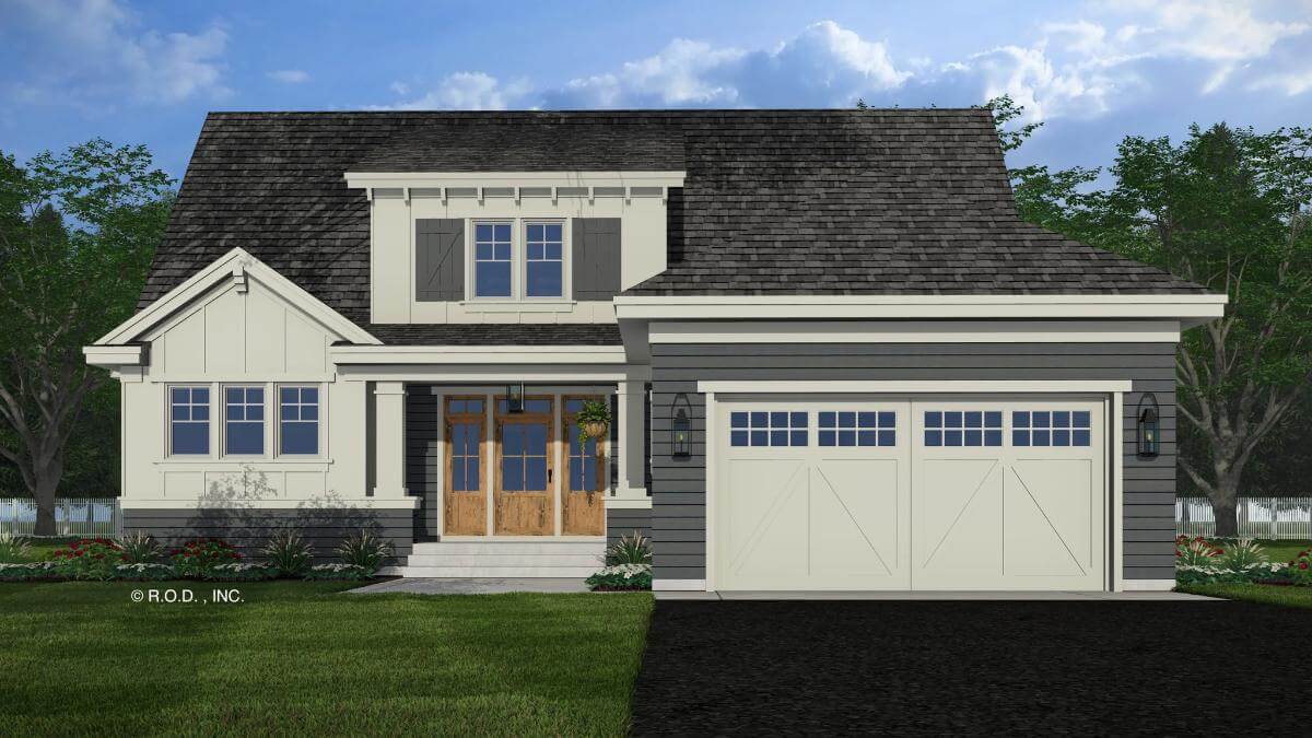 Front view with a double garage and a covered entry porch topped by a shed dormer.