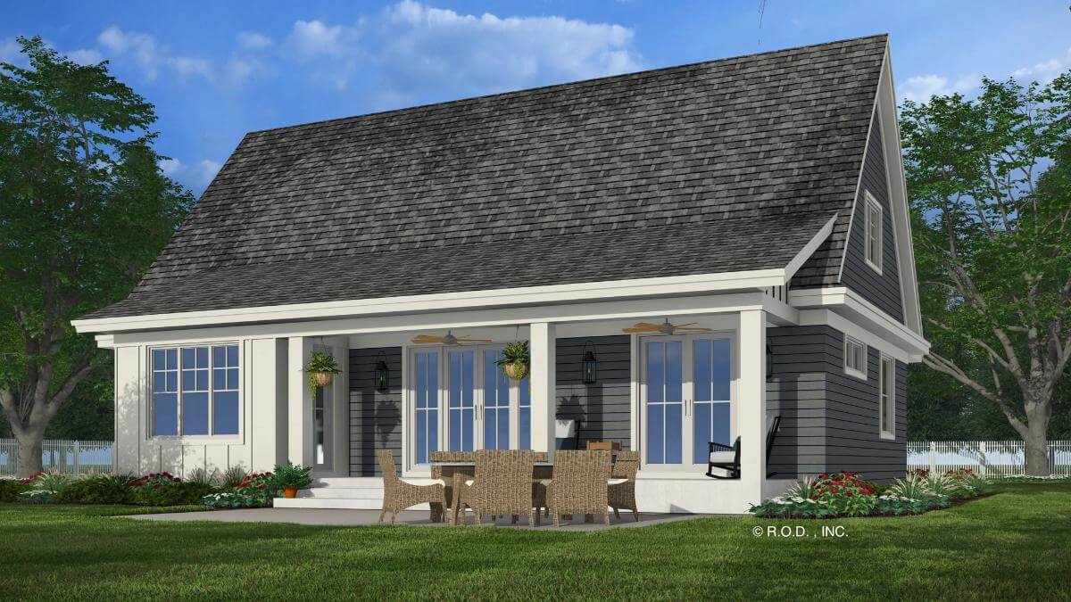 Rear view with a covered porch and a concrete patio.