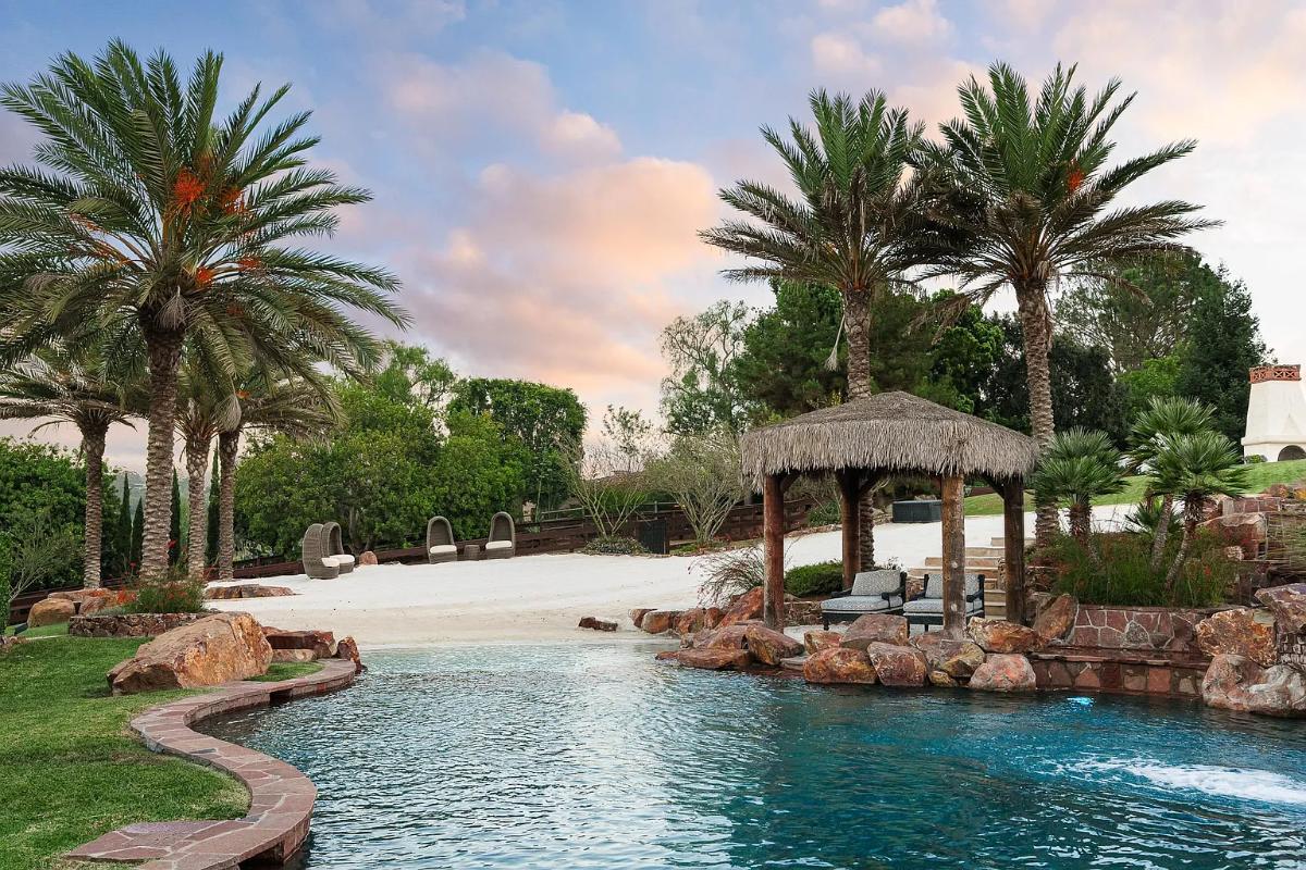 Pool with lounge chairs.