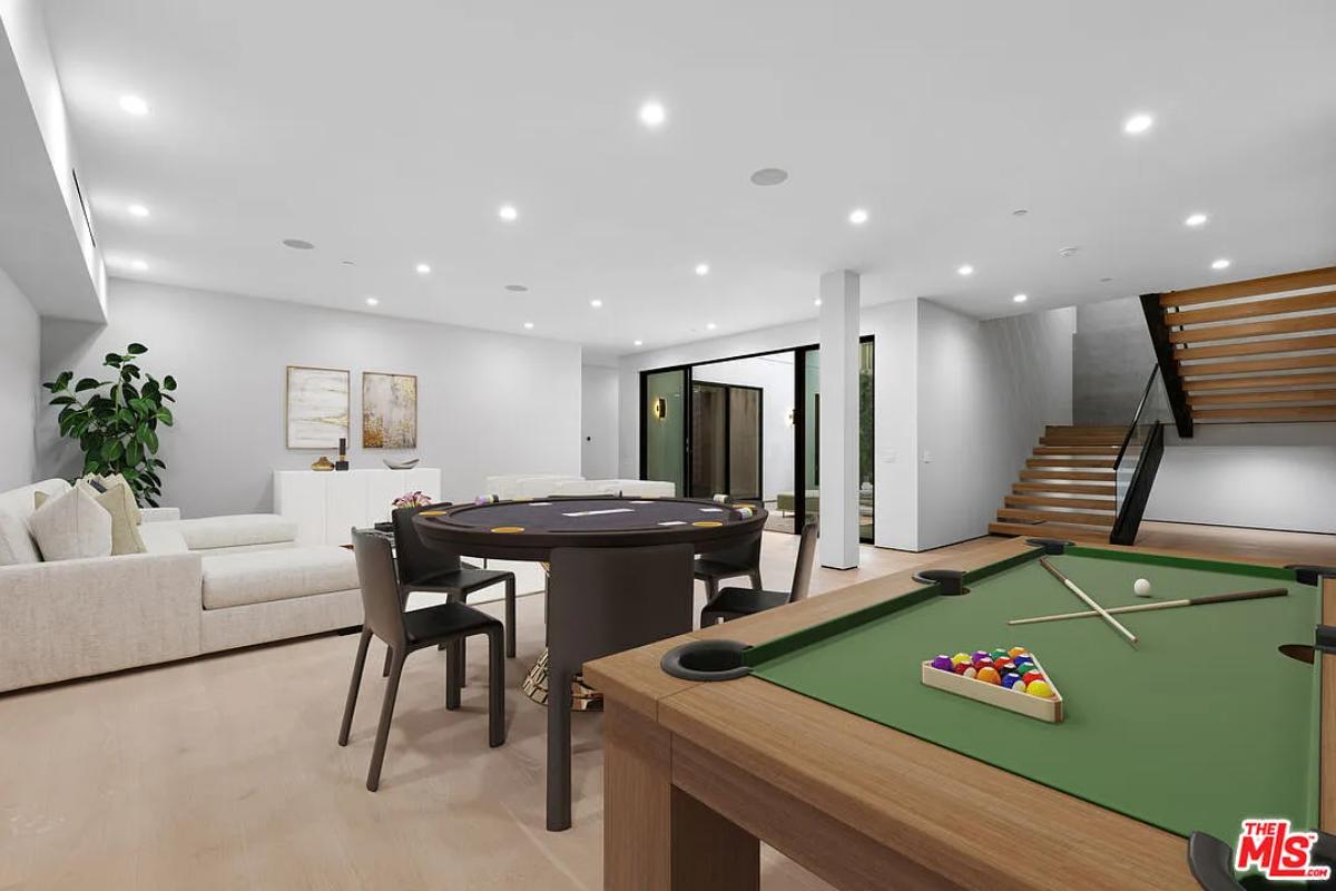 Recreation room with a pool table.
