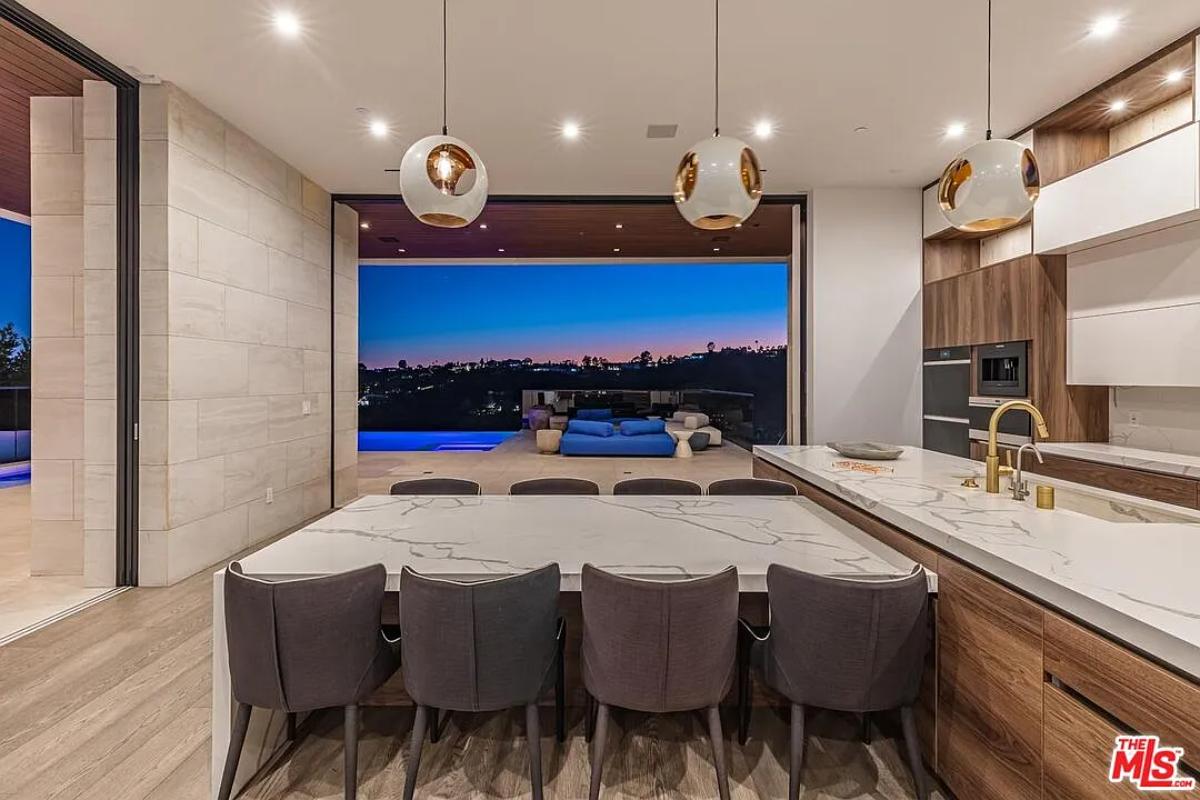 Kitchen with a counter breakfast bar and a center island prep area.